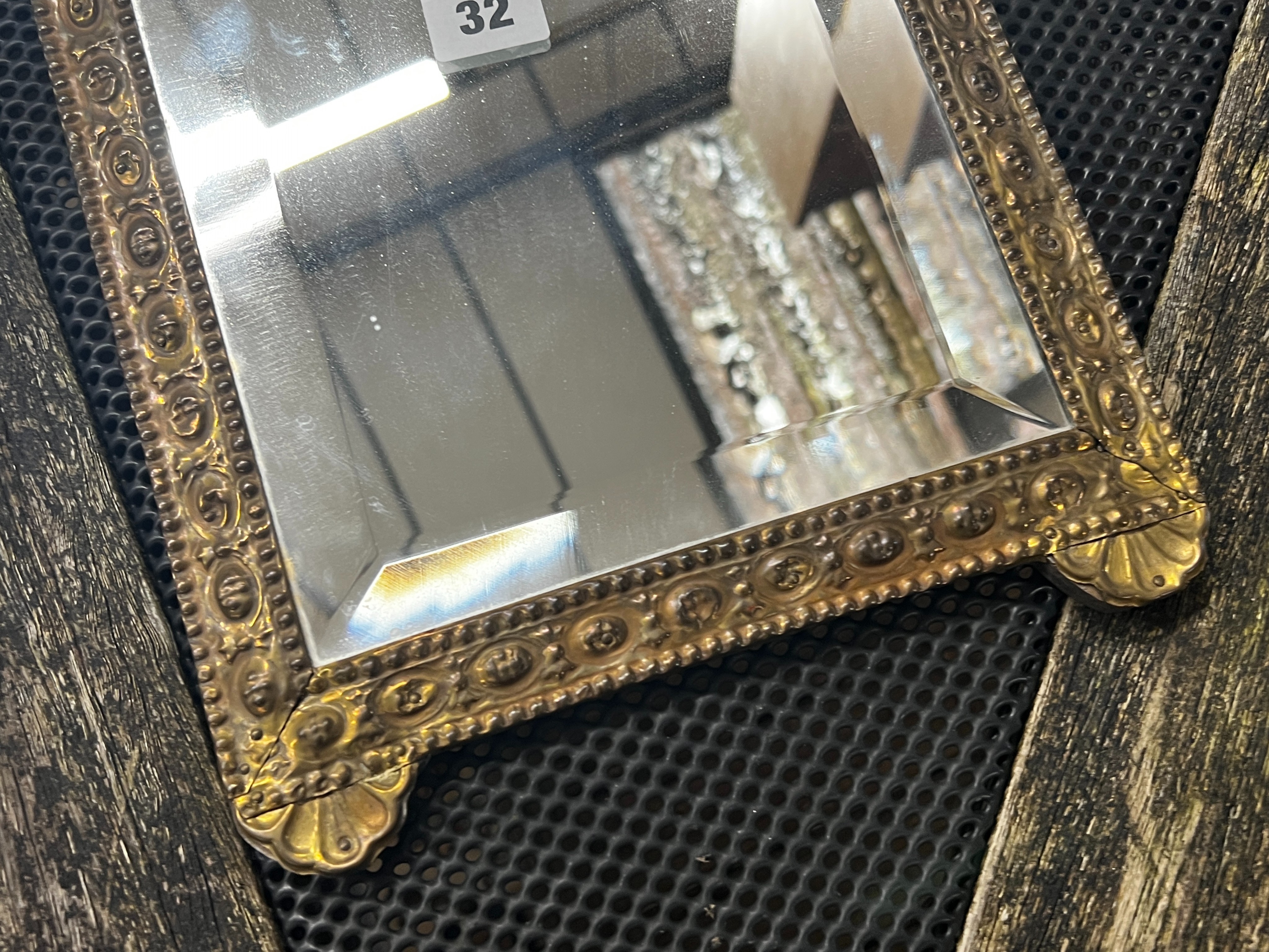 Two small 19th century French embossed brass wall mirrors, larger height 51cm